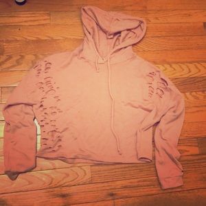a medium pink copped hoodie
